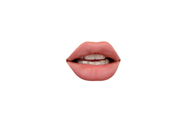 Close up view of female mouth wearing nude lipstick isolated over white studio background - Fotó, kép