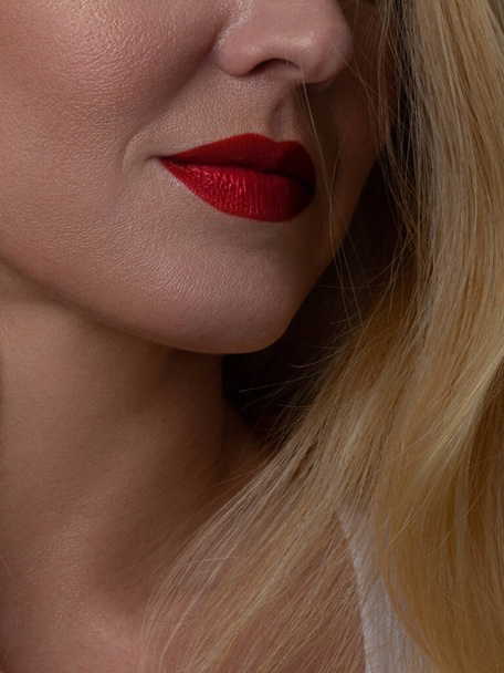 Perfect red lip maqullage. Close up macro cropped photo with beautiful attractive female mouth, wellness, wellbeing, treatment, therapy concept, isolated on grey background - Φωτογραφία, εικόνα
