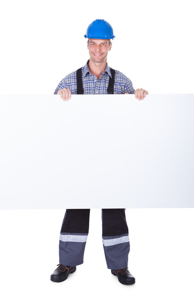Male Worker With Blank Placard - Foto, immagini