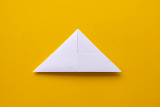 assembly procedure for a white paper ship. Origami. Creature. - Fotografie, Obrázek