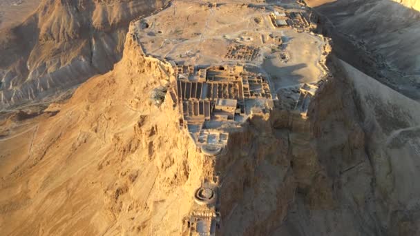 Aerial view of the ruins of Massada is a fortress built by Herod the Great on a cliff-top off the coast of the Dead Sea. Destroyed by the Romans in the 1st century AD e. Included in the UNESCO World Heritage List - Footage, Video