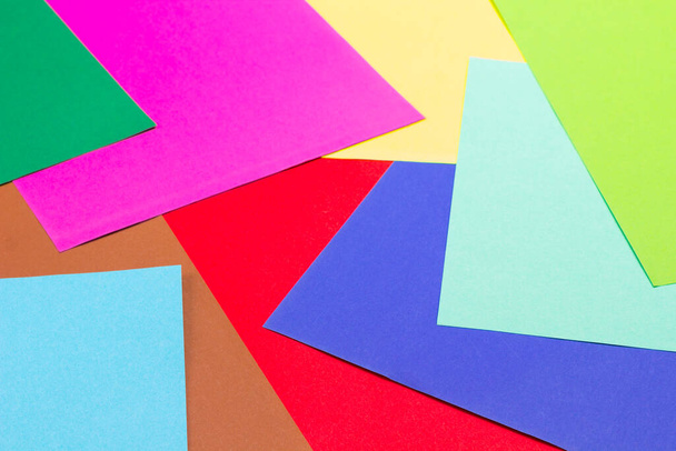 Colorful papers geometry flat composition background. Flat lay. Close up - Zdjęcie, obraz