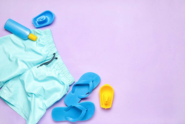 Set of beach accessories for children on color background - Foto, Imagem