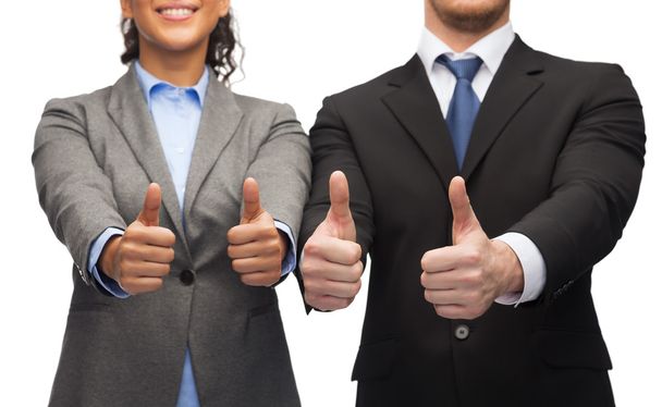 Businessman and businesswoman showing thumbs up - Foto, Imagem