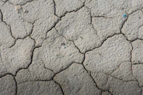 dried soil with lot of cracks in a quarry - Photo, Image