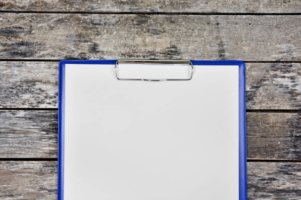 Close up of clipboard with blank white paper with pen - Photo, Image