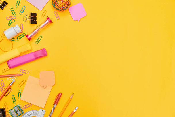Back to school concept, school supplies on yellow background,flat lay with copy space - Photo, Image