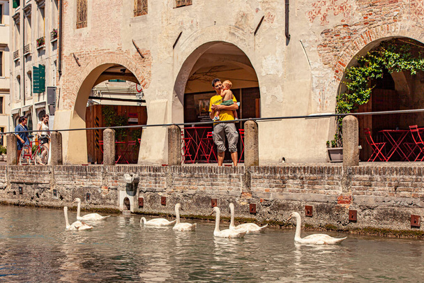 TREVISO, ITALY 13 AUGUST 2020: Isola della pescheria, fish market island in english, in Treviso in Italy - Zdjęcie, obraz