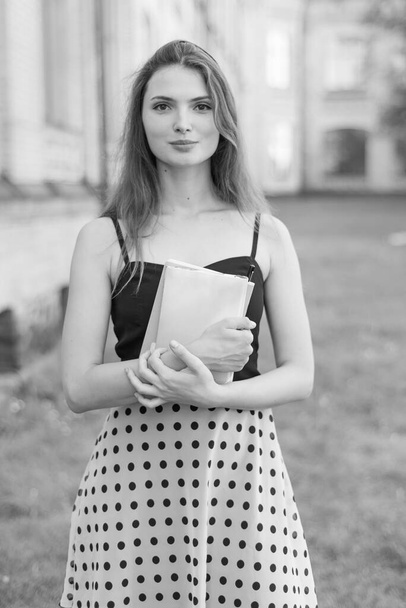 Young girl student in dress. Black and white photo. BW - Foto, imagen