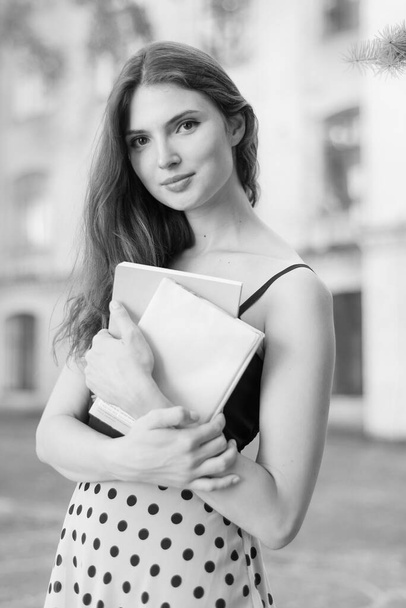 Young girl student in dress. Black and white photo. BW - Фото, зображення