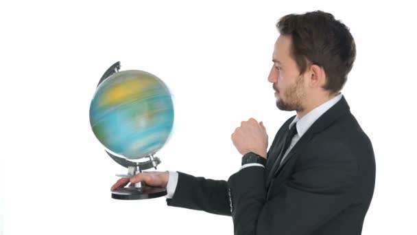 Businessman spinning a globe - Footage, Video