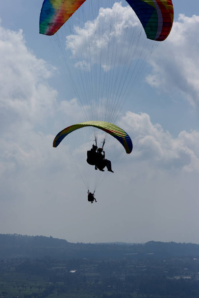 play paragliding beautiful scenery above the height - Photo, Image
