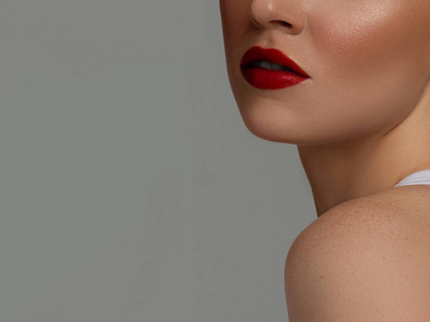 Closeup plump Lips. Lip Care, Augmentation, Fillers. Macro photo with Face detail. Natural shape with perfect contour. Close-up perfect red lip makeup beautiful female mouth. Plump sexy full lips - Photo, Image