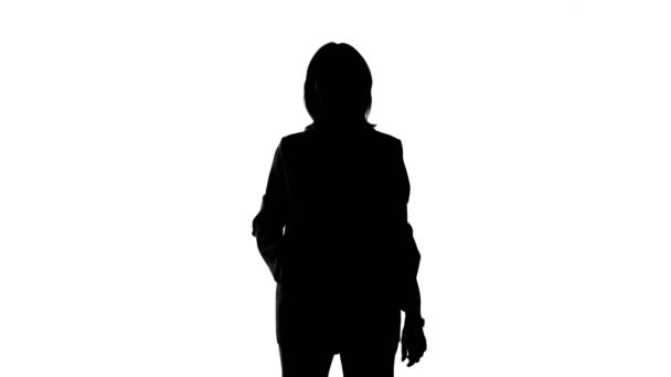 Video vom Werfen von Geld Frauensilhouette auf isoliertem weißen Hintergrund - Filmmaterial, Video
