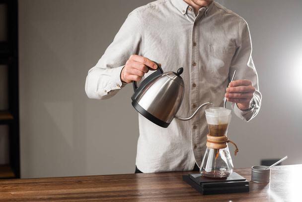 Brewing Pour Over Style of Coffee Making Dripping with Bubbles. Alternative coffee-making methods. Beautiful close up view or preparing morning coffee. Coffee industry. Coffee shop concept - Photo, Image