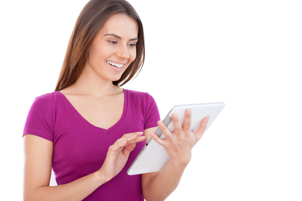 Young woman using digital tablet - Fotó, kép