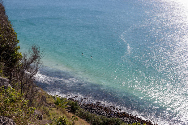 Rocky shore of Australian coastline with crystal clear waters - Фото, зображення