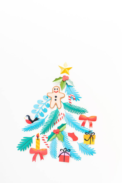 Paper art Christmas concept. Craft diy holiday. Decor form Christmas tree. Copy space vertical - Foto, Imagen