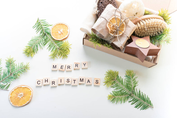 Christmas gift set. Eco friendly material. Zero waste. Wooden letters. Copy space - Фото, изображение