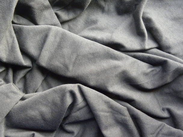 Szürke színű pamut szövet ráncokkal - Fotó, kép