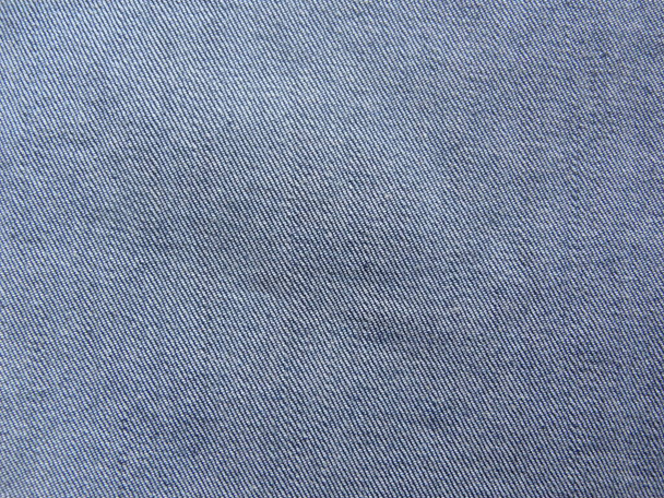 Verblasste blaue Farbe Jeans strukturierten Hintergrund - Foto, Bild