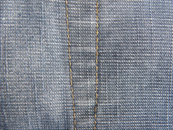 ブルーカラーデニムジーンズのストレートステッチ - 写真・画像