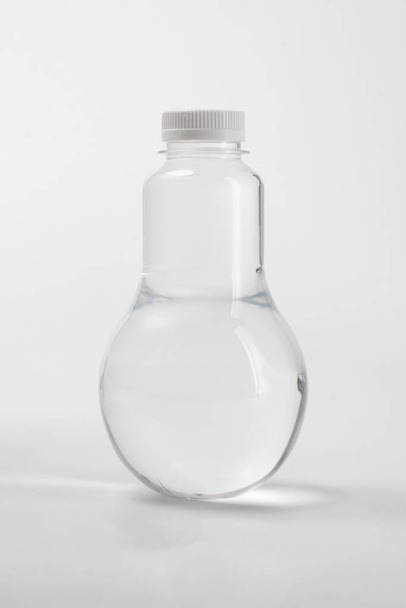 liquid product on blank plastic container bottle - Фото, изображение