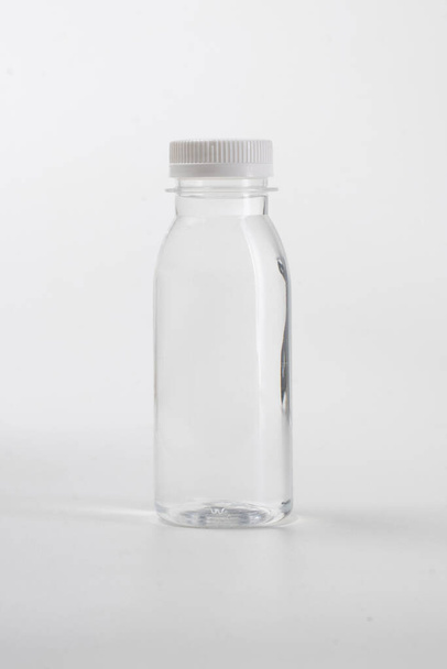 liquid product on blank plastic container bottle - Foto, Imagem