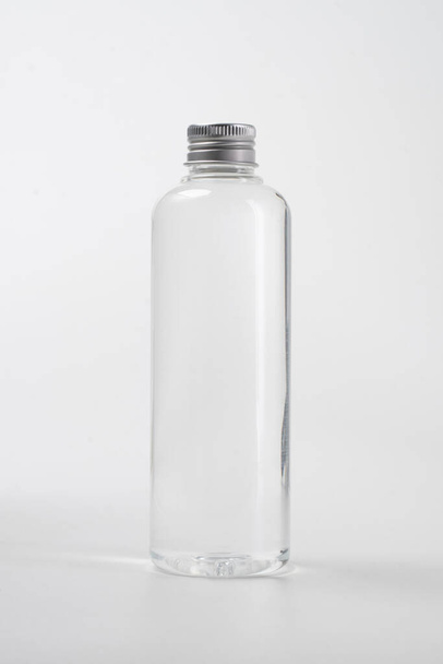 liquid product on blank plastic container bottle - 写真・画像