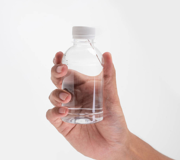 liquid product on blank plastic container bottle - Fotoğraf, Görsel