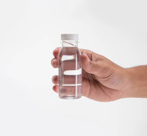 liquid product on blank plastic container bottle - Foto, Imagen