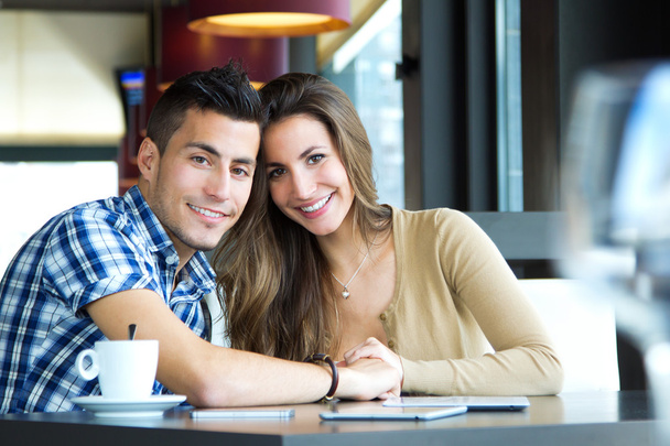 young couple in love at a coffee shop - Fotografie, Obrázek