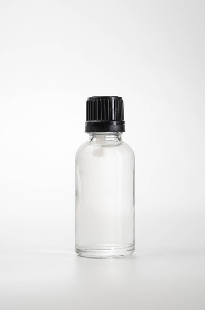 essential oil bottle. Mock up bottle cosmetic - Фото, изображение