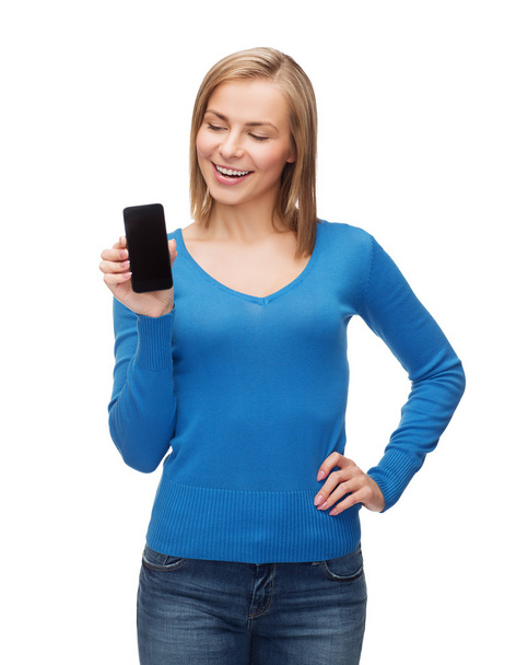 Smiling woman with black blank smartphone screen - Foto, immagini