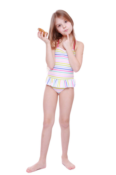 Girl in swimsuit with shell - Фото, зображення