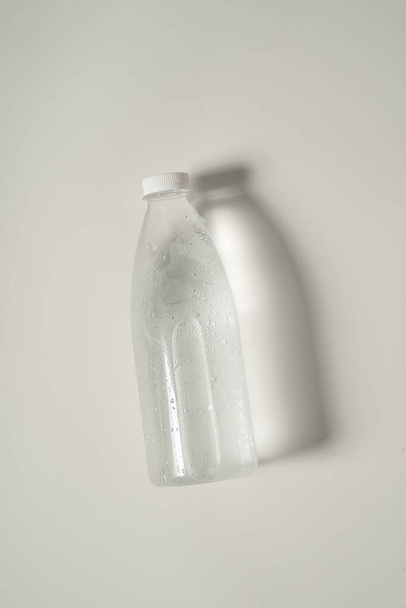 liquid product on blank plastic container bottle - Fotografie, Obrázek