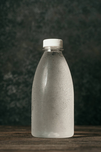 liquid product on blank plastic container bottle - Foto, Bild
