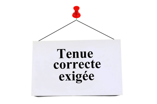 フランス語で書かれた適切なドレスコードが書かれた白い背景にピン留めカード - 写真・画像