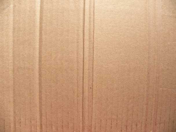 Boîte en carton beige fond texturé avec rides - Photo, image