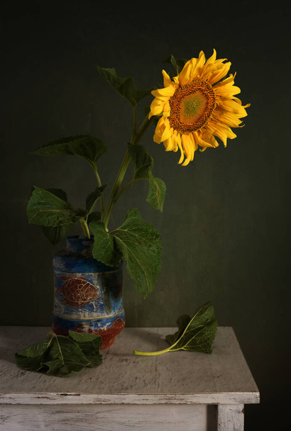 Still life with a beautiful sunflower. Vintage. Minimalism. - Foto, Imagen