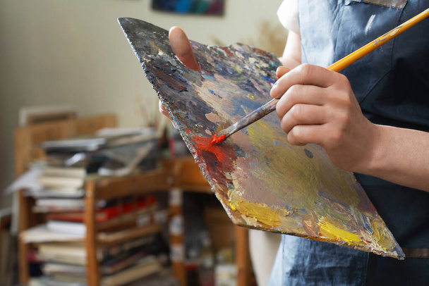 Woman hand close up painting - Фото, изображение