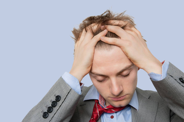 Stressed businessman with hands on head - Zdjęcie, obraz