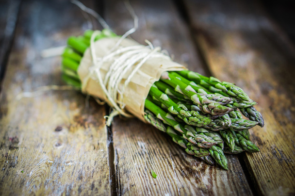 Asparagus on rustic wooden background - Zdjęcie, obraz