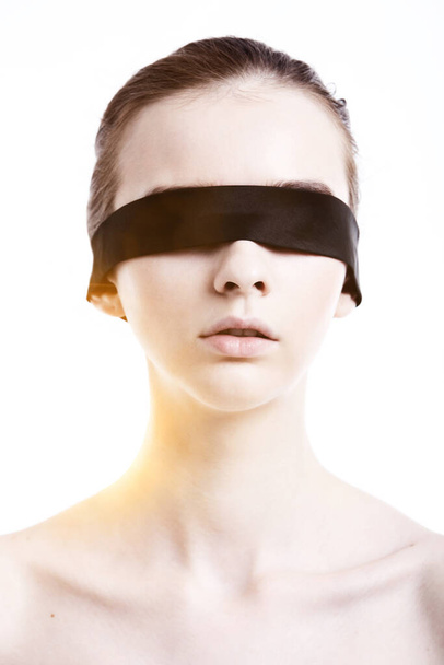 Caucasian woman wearing blindfold - Foto, Imagem