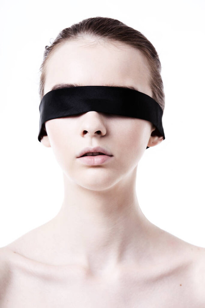 Caucasian woman wearing blindfold - Фото, зображення
