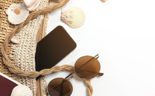 Accessories in knitted women bag  for vacation in summer, Isolated white background. - Foto, Imagem