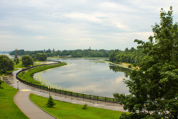 Strelka - the confluence of two rivers in Yaroslavl Russia on a cloudy summer day and a space for copying - Fotó, kép