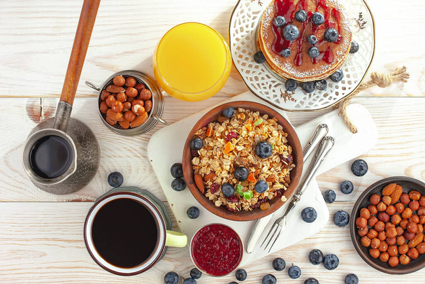 Healthy breakfast on an old background - Photo, Image
