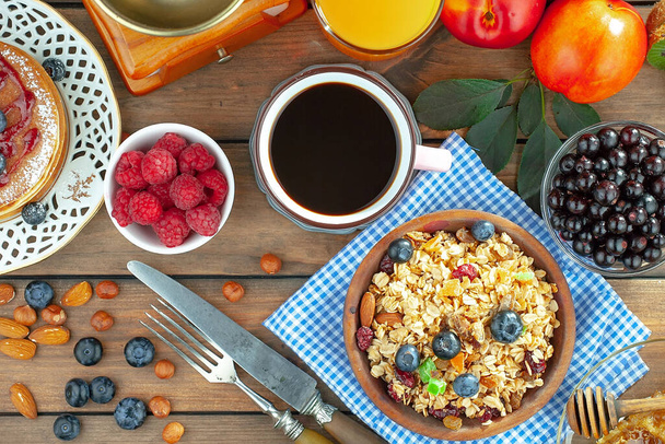 Healthy breakfast on an old background - Photo, Image