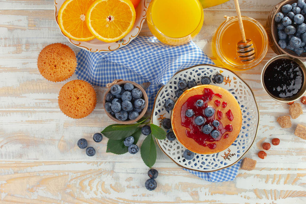 Healthy breakfast on an old background. The concept of tasty and healthy food. - Foto, imagen